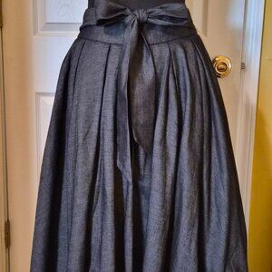 Asymmetrical skirt with matching tie belt